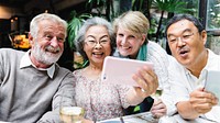 Group of senior friends selfie, smile and happy. Smiling diverse senior friends take selfie photo. Happy senior friends have fun time, diverse group selfie together, diverse senior friends selfie