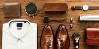 A stylish men's outfit flat lay featuring a white shirt, brown shoes, a tie, and accessories. This men's fashion display includes a watch, wallet, and grooming items, perfect for men fashion's.