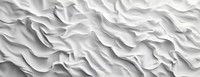 White background with wavy creases white texture fabric.