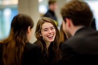 Young businesswoman laughing meeting person people.