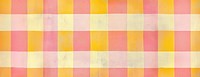 Pink yellow orange checkered texture background pattern.