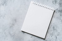 A single white notepad background page notebook.