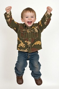 Happy kid jumping photo jeans photography.