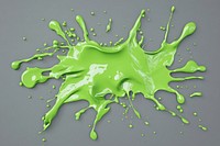 Green paint splashes vibrant color expression.