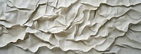 Crumpled paper texture folds background decorative.