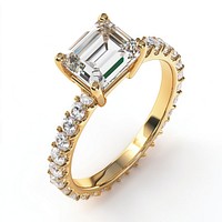 A emerald-cut engagement ring with a diamond band in gold accessories accessory jewelry.