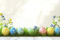 Colorful Easter eggs on a wooden table flowers grass colorful.