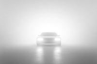 A white background with an empty space in the center fog car headlights.