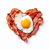 Bacon and fried egg heart shape food.