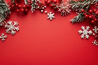 Red background with small snowflakes christmas festive red.