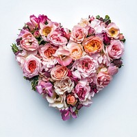 A heart-shaped arrangement of pink rose flowers roses pink roses.