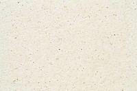 A flat texture of off-white cardboard paper background textured.