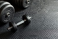 Dumbbells on the floor fitness gym exercise.