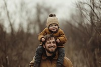 Happy father and son nature background clothing.