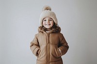 Happy kid wearing a winter jacket clothing smile photo.