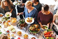 Diverse group of people enjoying buffet with various dishes. Diverse people serving food, buffet with salads, meats, and seafood. Social gathering, diverse buffet, food variety.