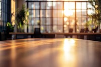 Modern office scene sunlight windows plants.