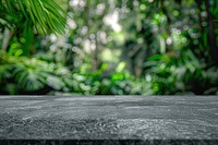 Empty gray stone table leaf background outdoors.