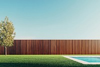 A modern grass backyard with a wooden fence and a swimming pool minimalist outdoors landscape.