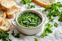 Green cream cheese spread bread fresh herbs.