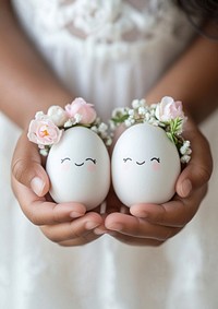 Easter eggs flowers smiling crowns.