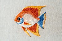 Anglefish embroidery style fabric handcrafted needlework.