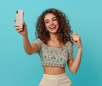 Woman is holding the phone smile hair background.