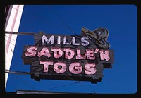 Mills Saddle N' Togs sign, Ellensburg, Washington (1987) photography in high resolution by John Margolies. Original from the Library of Congress. 