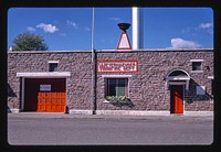 Fire Department (1938), detail, Main Street, Weyerhaeuser, Wisconsin (1988) photography in high resolution by John Margolies. Original from the Library of Congress. 
