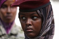 A soldier listens to Djiboutian Contingent Commander Osman Doubad speaking to members of the Somali National Army at Lama Galay training camp in Belet Weyne, Somalia, on October 13. AU UN IST PHOTO / Ilyas A. Abukar. Original public domain image from Flickr