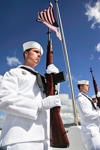 U.S. Sailors participate in a ceremony for Pearl Harbor survivor Coxswain Gale D. Mohlenbrink at the USS Utah Memorial on Ford Island in Pearl Harbor, Hawaii, Oct. 29, 2013.