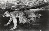Miner. Original public domain image from <a href="https://www.flickr.com/photos/departmentofenergy/11355230705/" target="_blank">Flickr</a>