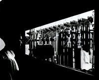 View, taken through several inch-thick shielding-glass, shows some of the process tanks used in the recovery of plutonium from scrap and process residue at the Hanford chemical processing operations. Circa 1968. Original public domain image from Flickr