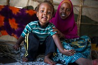 Two year old Nasri stares at the camera. Nasri was born to Ifrah Abdulle soon after her mother got married. Ifrah has sworn to not let her child undergo FGM. AU UN IST PHOTO / David Mutua. Original public domain image from Flickr