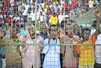 Young men watch a football match in Mogadishu, Somalia, between the Somali Police Force and the Somali National Army on January 31. AU UN IST PHOTO / Tobin Jones. Original public domain image from <a href="https://www.flickr.com/photos/au_unistphotostream/12250638696/" target="_blank" rel="noopener noreferrer nofollow">Flickr</a>