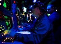 U.S. Sailors monitor a sonar console for contacts aboard the guided missile destroyer USS Donald Cook (DDG 75) in the Mediterranean Sea April 1, 2014, during an antisubmarine warfare exercise in support of Noble Dina 2014.