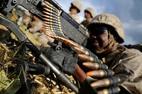 U.S. Marine Corps Pvt. James Jamison, a machine gunner with the 1st Battalion, 23rd Marine Regiment, fires an M240B machine gun during a live-fire range at Fort Polk, La., June 2, 2014.