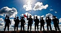 U.S. Soldiers with Charlie Company, 2nd Battalion, 104th Cavalry Regiment, Pennsylvania Army National Guard pose for a photo June 17, 2014, after a battle simulation for distinguished visitors during Saber Strike 2014 in Latvia.