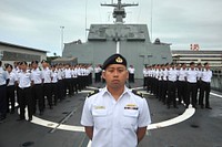 Singapore service members stand by for morning colors aboard the frigate RSS Intrepid (F 69) at Joint Base Pearl Harbor-Hickam, Hawaii, June 29, 2014, during the Rim of the Pacific (RIMPAC) 2014 exercise.