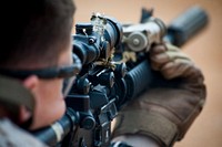 U.S. Marine Corps Lance Cpl. John Wachman with Echo Company 4th Reconnaissance Battalion battle sight zeroes his weapon during a live fire exercise at Camp Upshur, Marine Corps Base (MCB) Quantico, Va., July 21, 2014.