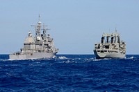 The guided missile cruiser USS Port Royal (CG 73), left, prepares to refuel at sea with the Royal Australian Navy multiproduct replenishment oiler HMAS Success (OR 304) during Rim of the Pacific (RIMPAC) 2014 in the Pacific Ocean July 19, 2014.