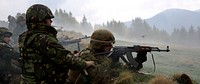 U.S. Marine Corps Cpl. Matthew Haines, a mortarman with the 3rd Battalion, 8th Marine Regiment, assigned to Black Sea Rotational Force (BSRF) 14-2, fires a Romanian AK-47 assault rifle May 13, 2014, during a live-fire exercise as part of Platinum Lynx 14-5 in the Carpathian Mountains in Romania.