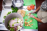 US army preparing food in kitchen. Original public domain image from Flickr