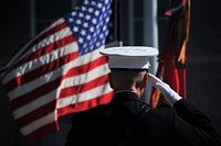 U.S. Marine Corps Gen. James F. Amos, the outgoing commandant of the Marine Corps, salutes the colors during the passage of command ceremony at Marine Barracks Washington in Washington, D.C., Oct. 17, 2014.