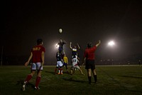 U.S. Sailors and Marines assigned to the amphibious assault ship USS America (LHA 6) and Peruvian sailors play rugby in Callao, Peru, Sept. 1, 2014.