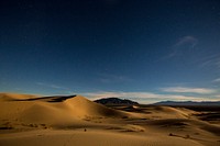 These small dunes were formed by north winds pushing sands off the Cadiz Dry Lake. The pristine nature of the dunes and the beautiful spring display of unique dune plants have made the area a favorite for photographers.