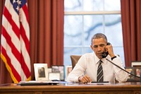 President Barack Obama talks on the phone in the Oval Office with Major General Joe Osterman, Commander of Marine Special Operations Command, about the UH-60 Black Hawk helicopter that apparently crashed in waters off Florida during a routine night training mission, March 10, 2015.