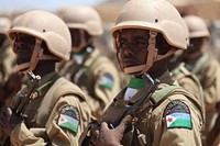 Soldiers belonging to the African Union Mission in Somalia (AMISOM) welcome the President of Somalia, Hassan Sheikh Mohamud, and the President of Djibouti, Ismaïl Omar Guelleh, to Beletweyne, Somalia, on February 22.