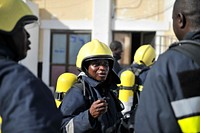 Joint Somali and AMISOM firefighters in a drill conducted upon completion of a refresher training in aviation fire fighting held in Mogadishu, Somalia on April 21, 2015.