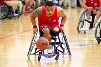 during wheelchair basketball preliminary rounds for the 2015 Department of Defense Warrior Games at Marine Corps Base Quantico, Va. June 20, 2015. (Department of Defense photo by EJ Hersom). Original public domain image from Flickr